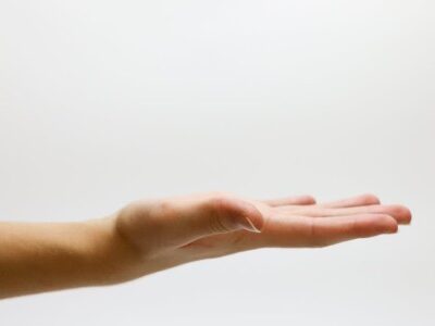 Hand reaching out for a raise