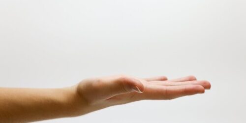 Hand reaching out for a raise