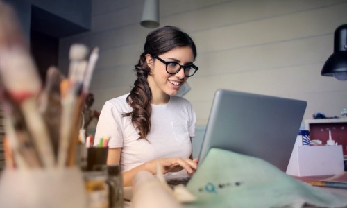 Millennial Millennial woman working in an office