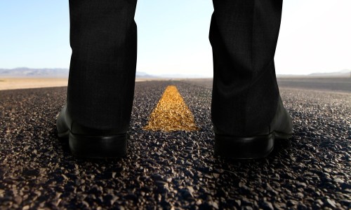 CareerChange Man standing on the road thinking about a career change