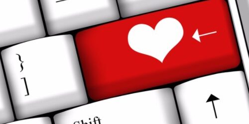 Keyboard with red heart on the Enter Key