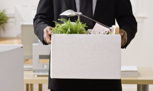 Fired2 Fired Employee Leaving with Box of Personal Belongings