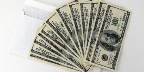 Salaries Money in an envelope used to pay salaries or bonuses