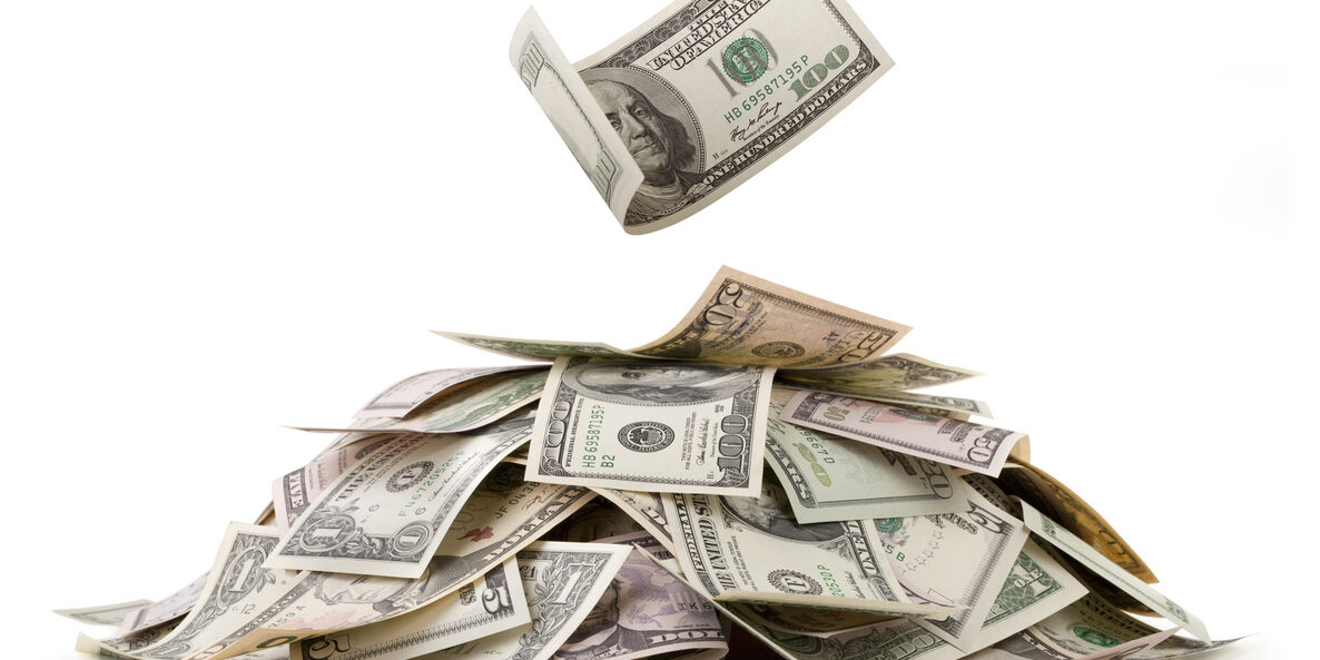 Heap of money. Dollar bills.